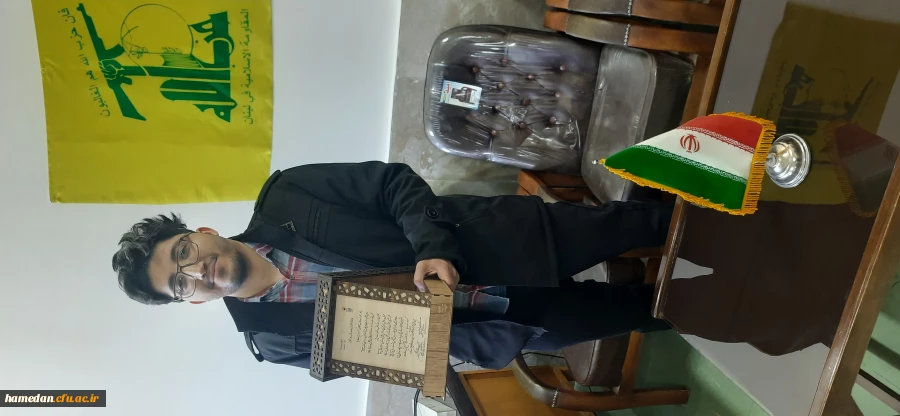 اهدای لدح تقدیر نفر دوم مرحله ملی سی و چهارمین جشنواره قرآن و عترت 3