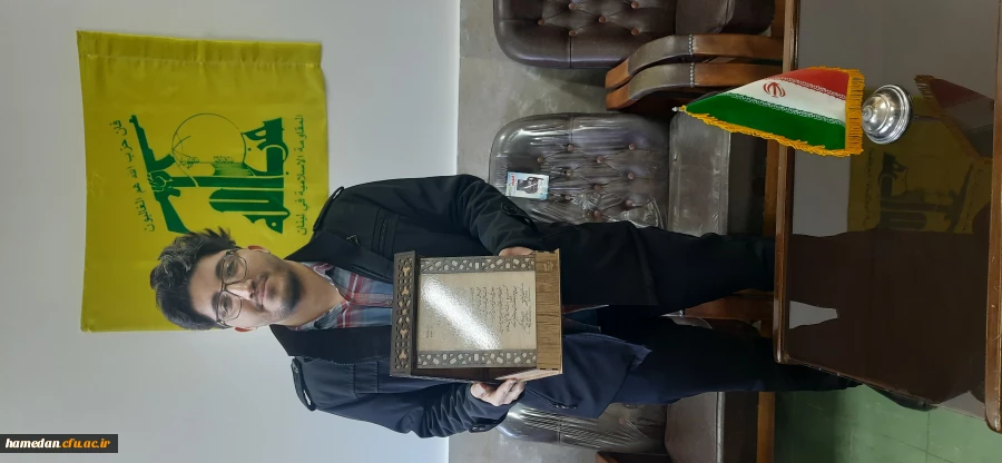 اهدای لدح تقدیر نفر دوم مرحله ملی سی و چهارمین جشنواره قرآن و عترت 4